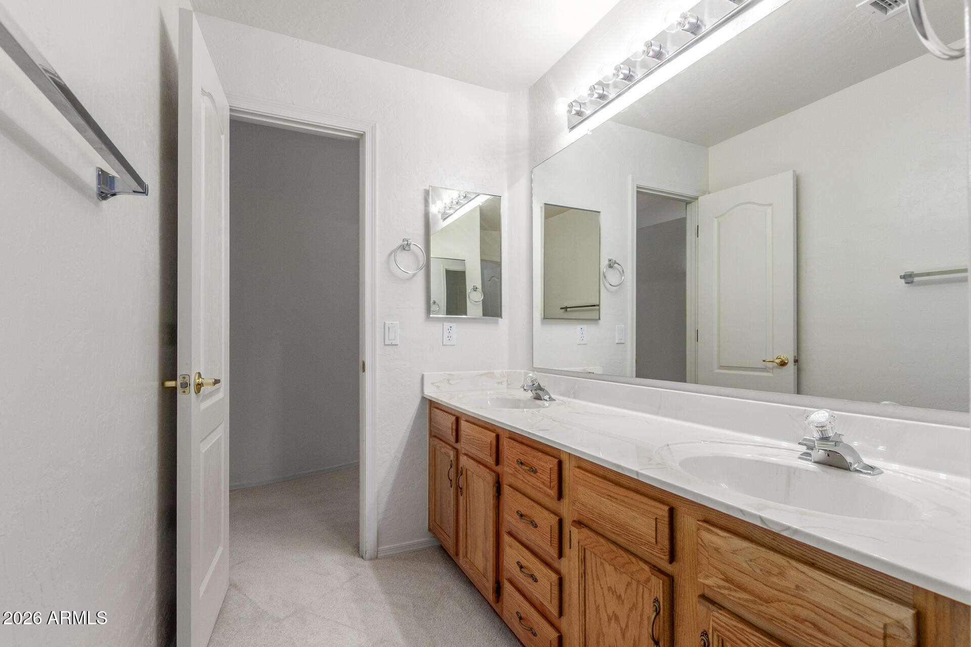 3430 North Mountain Ridge, Unit 13 Mesa, AZ 85207 - Photo 51 of 124 a bathroom with a double vanity sink and mirror