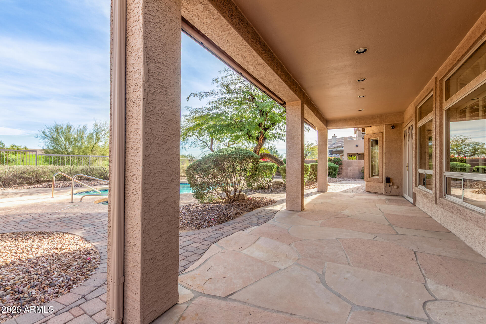 3430 North Mountain Ridge, Unit 13 Mesa, AZ 85207 - Photo 74 of 115 a view of a porch with wooden floor and outer view