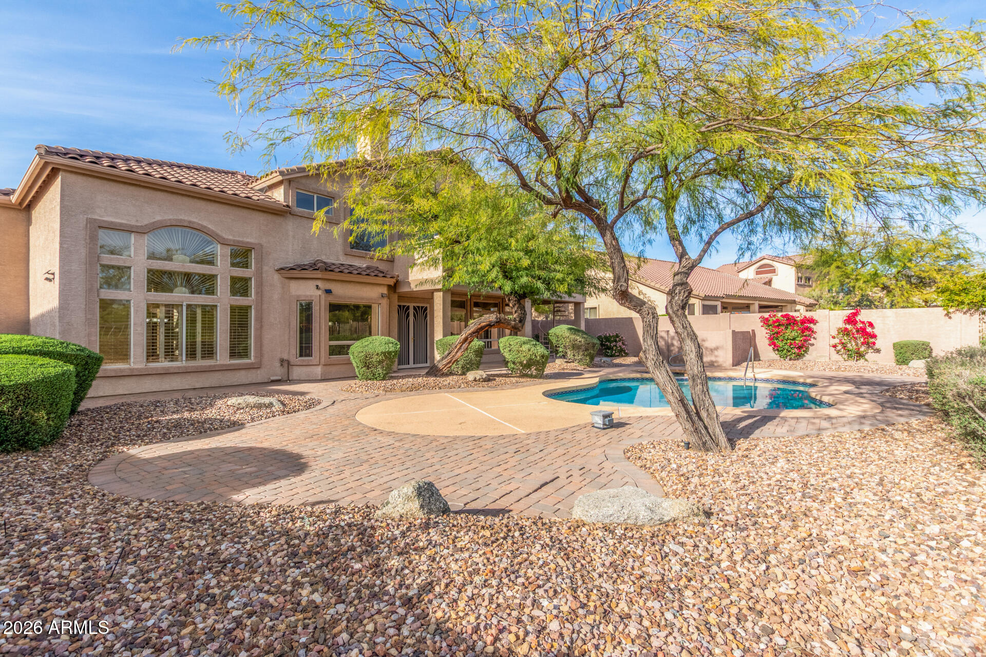 3430 North Mountain Ridge, Unit 13 Mesa, AZ 85207 - Photo 77 of 115 a house with trees in front of it