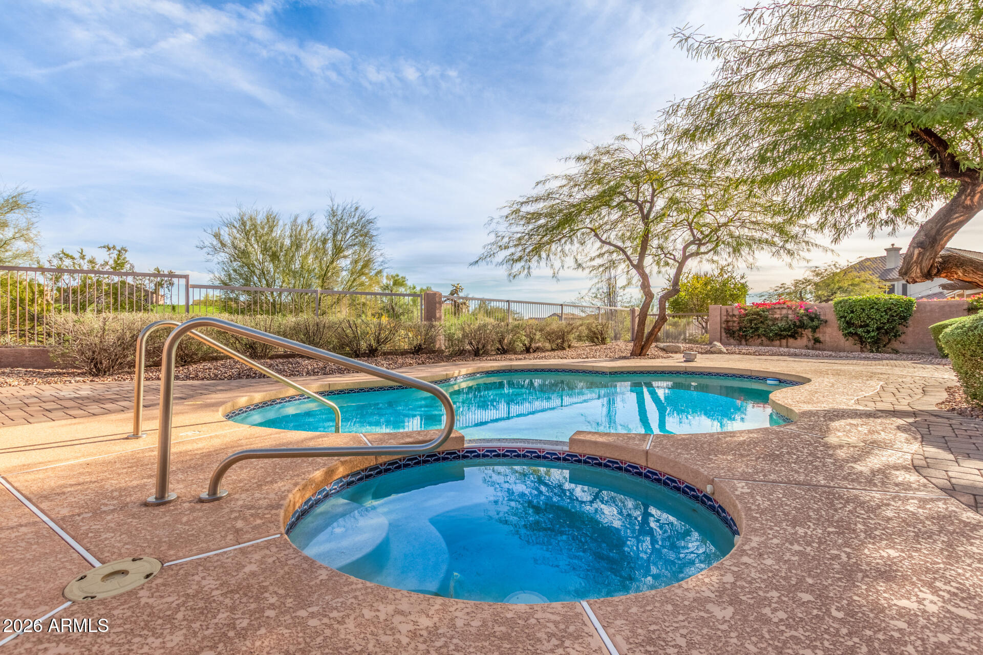 3430 North Mountain Ridge, Unit 13 Mesa, AZ 85207 - Photo 80 of 115 a view of a swimming pool with an outdoor seating