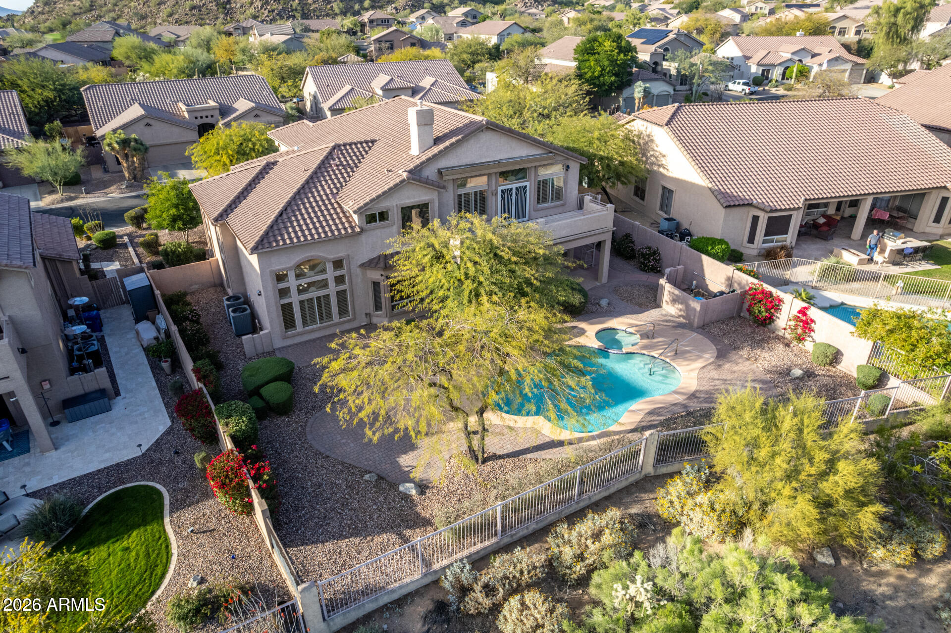 3430 North Mountain Ridge, Unit 13 Mesa, AZ 85207 - Photo 86 of 115 an aerial view of a house with a yard and potted plants