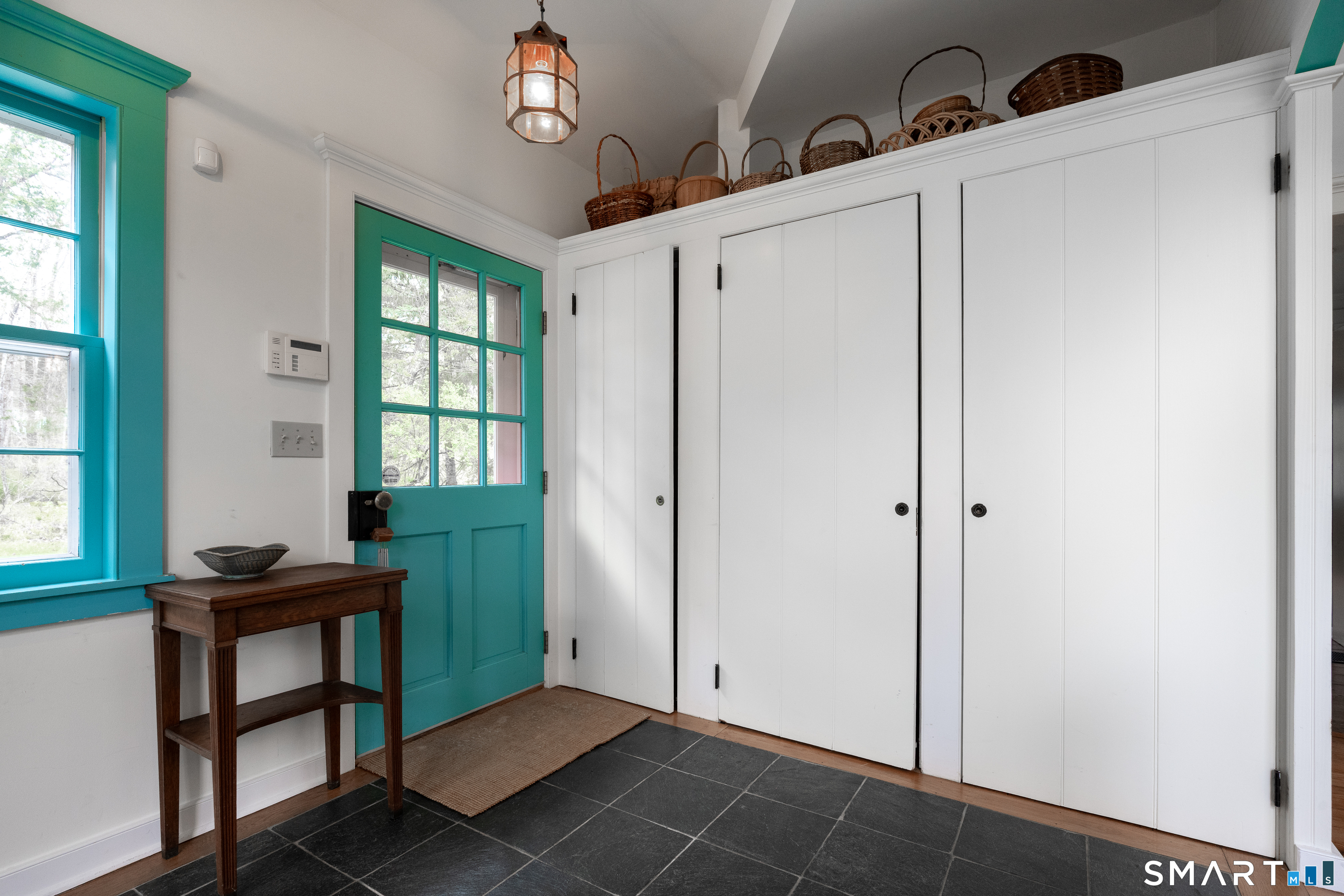 221 Segar Mountain Road Kent, CT 06785 - Photo 27 of 40 Spacious mud room with large pantry and stacked washer and dryer