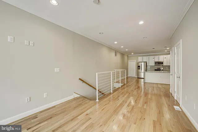 a view of kitchen with wooden floor