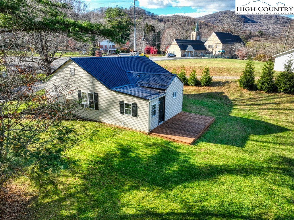494 Frank Edwards Road West Jefferson, NC 28694 - Photo 4 of 27 a aerial view of a house with swimming pool