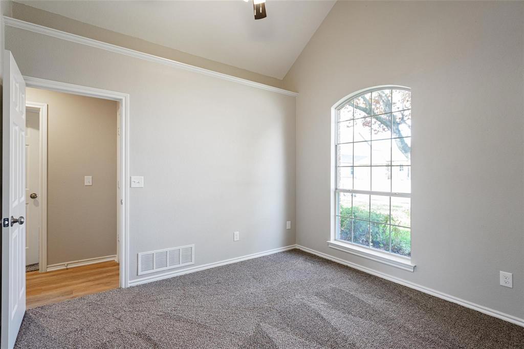 1006 Merribrook Lane Allen, TX 75002 - Photo 21 of 29 an empty room with windows
