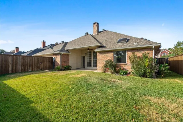 a front view of a house with yard