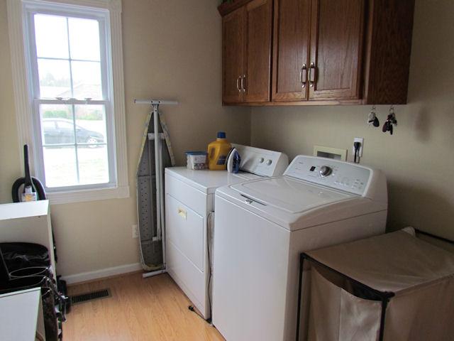 52 Spring Creek Road Lebanon, TN 37087 - Photo 14 of 17 The large 7 x 10 utility room has built in cabinets.