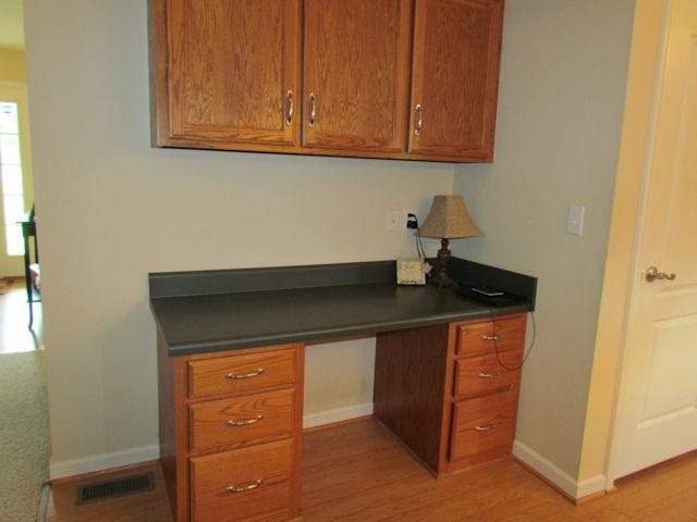 52 Spring Creek Road Lebanon, TN 37087 - Photo 5 of 17 Here is a desk in the kitchen area.