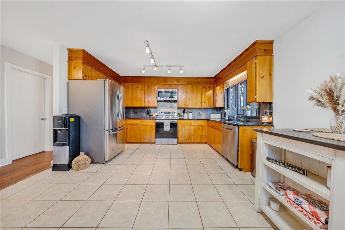 2800 Old Ferrum Road Ferrum, VA 24088 - Photo 14 of 58 a large white kitchen with cabinets