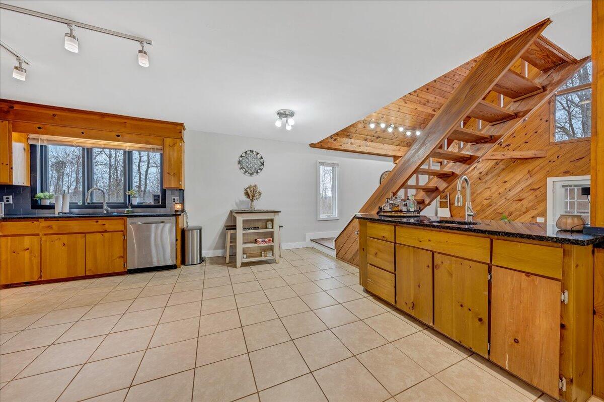 2800 Old Ferrum Road Ferrum, VA 24088 - Photo 19 of 58 a kitchen with stainless steel appliances granite countertop a sink and a stove