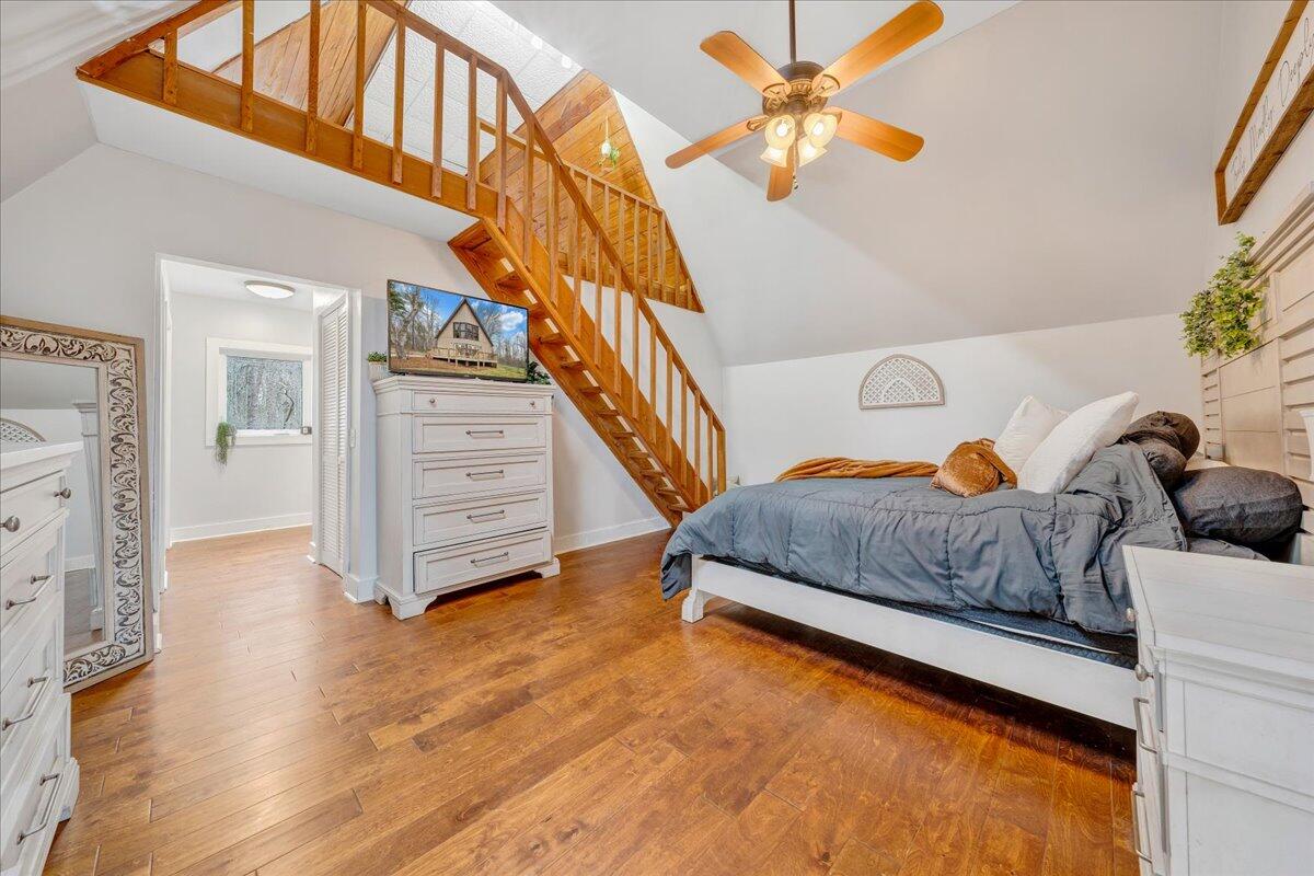 2800 Old Ferrum Road Ferrum, VA 24088 - Photo 26 of 58 a bedroom with a bed and a chandelier