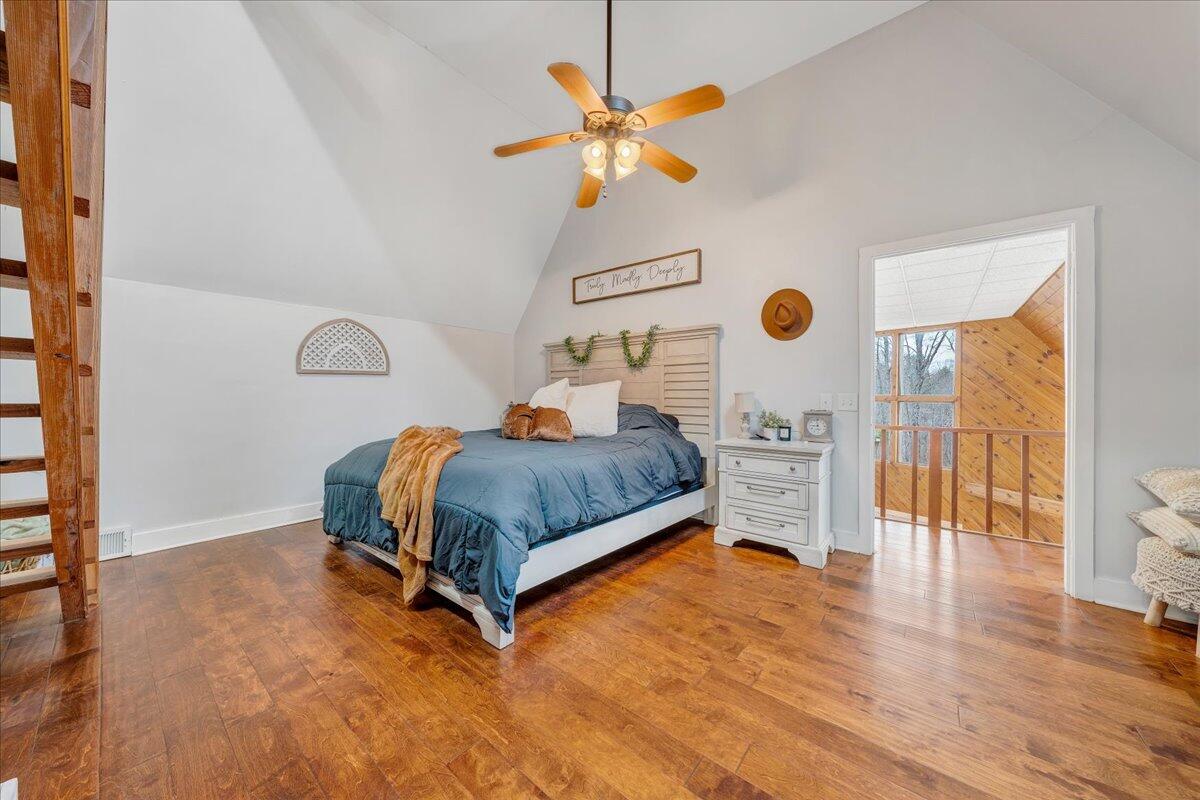 2800 Old Ferrum Road Ferrum, VA 24088 - Photo 27 of 58 a bedroom with a bed and wooden floor