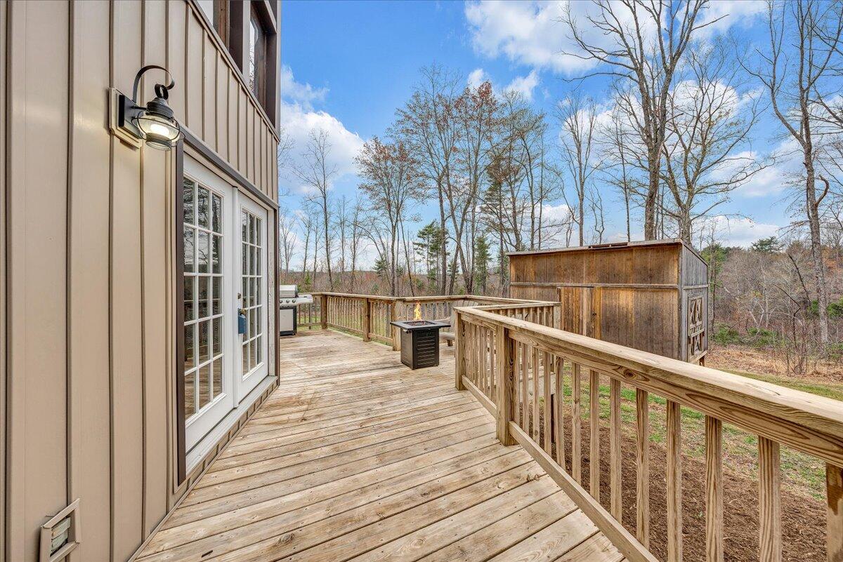 2800 Old Ferrum Road Ferrum, VA 24088 - Photo 36 of 58 a view of a balcony with wooden floor and fence