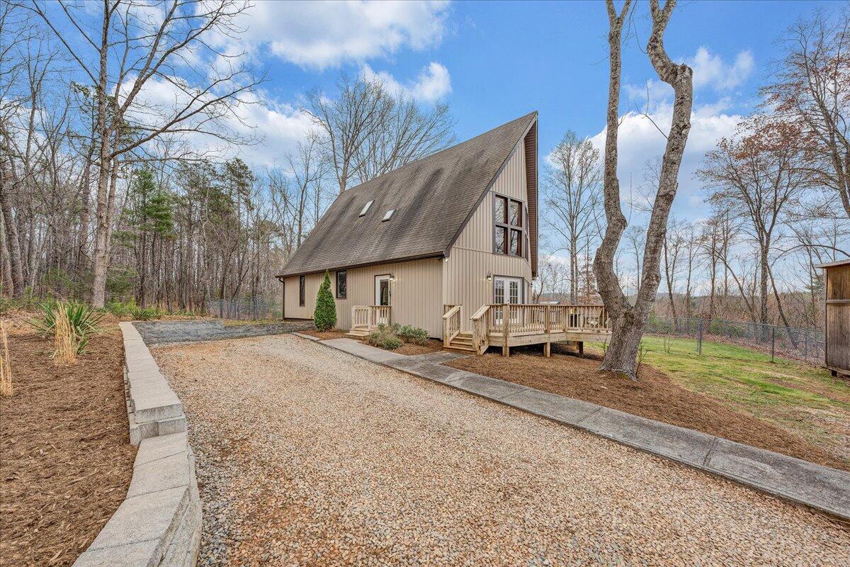 2800 Old Ferrum Road Ferrum, VA 24088 - Photo 37 of 58 a view of a house with trees in the background