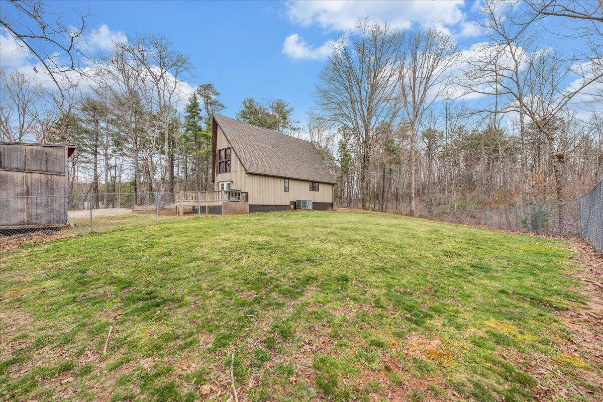 2800 Old Ferrum Road Ferrum, VA 24088 - Photo 43 of 58 a view of a backyard with a large tree