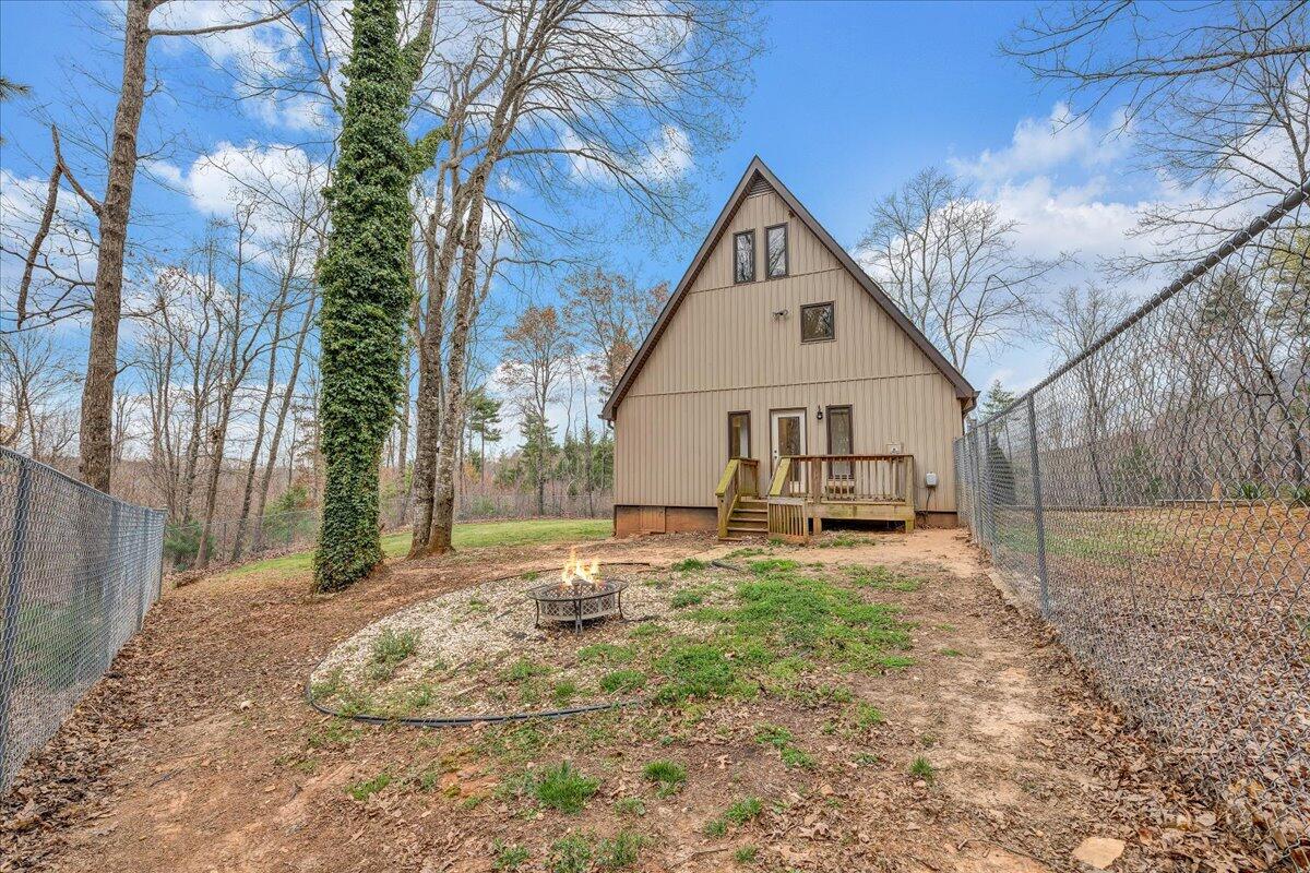 2800 Old Ferrum Road Ferrum, VA 24088 - Photo 48 of 58 a view of a house with backyard and trees