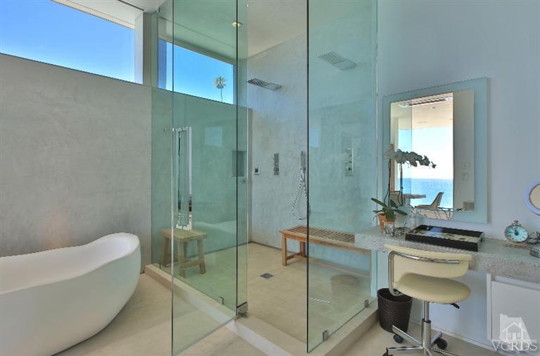 25236 Malibu Road Malibu, CA 90265 - Photo 21 of 33 a bathroom with a shower a sink a toilet and a bathtub