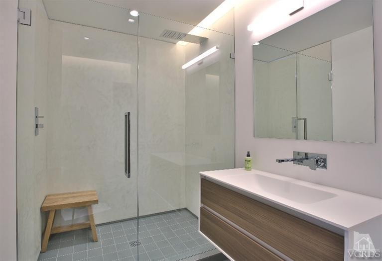 25236 Malibu Road Malibu, CA 90265 - Photo 25 of 33 a bathroom with a sink a toilet and a mirror
