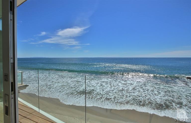 25236 Malibu Road Malibu, CA 90265 - Photo 29 of 33 a view of a glass door with a view of roof