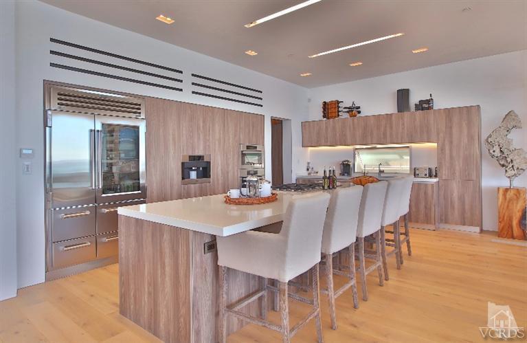 25236 Malibu Road Malibu, CA 90265 - Photo 6 of 33 a dining table with chairs and window