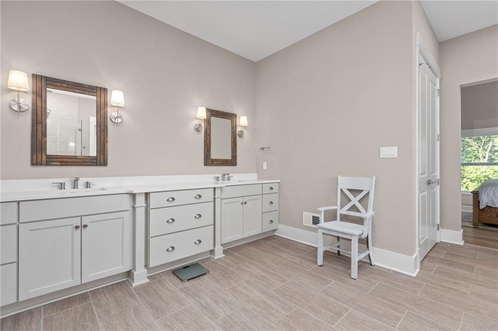 2010 Cherry Road Gibsonia, PA 15044 - Photo 11 of 25 a spacious bathroom with a double vanity sink and a mirror