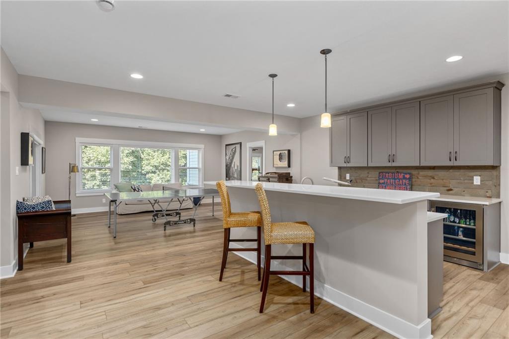 2010 Cherry Road Gibsonia, PA 15044 - Photo 21 of 25 a living room with stainless steel appliances granite countertop furniture wooden floor and a view of kitchen