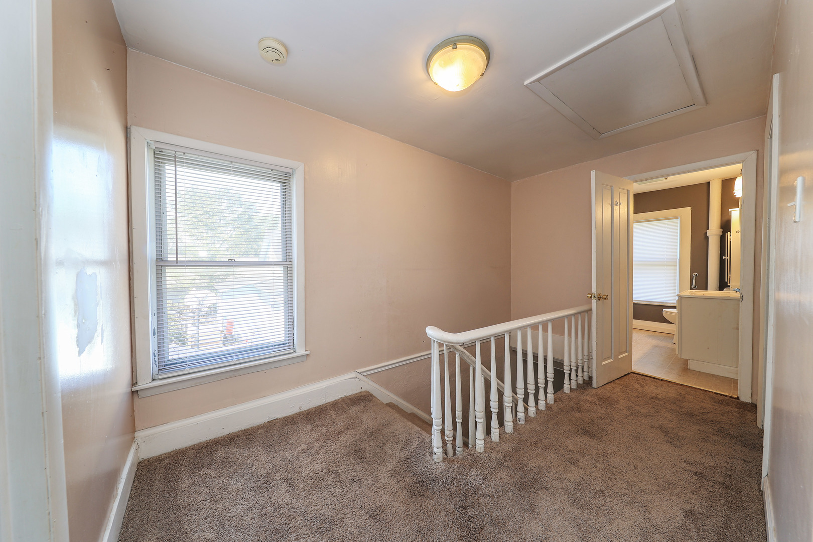 115 North Main Street Seneca, IL 61360 - Photo 16 of 17 an empty room with windows