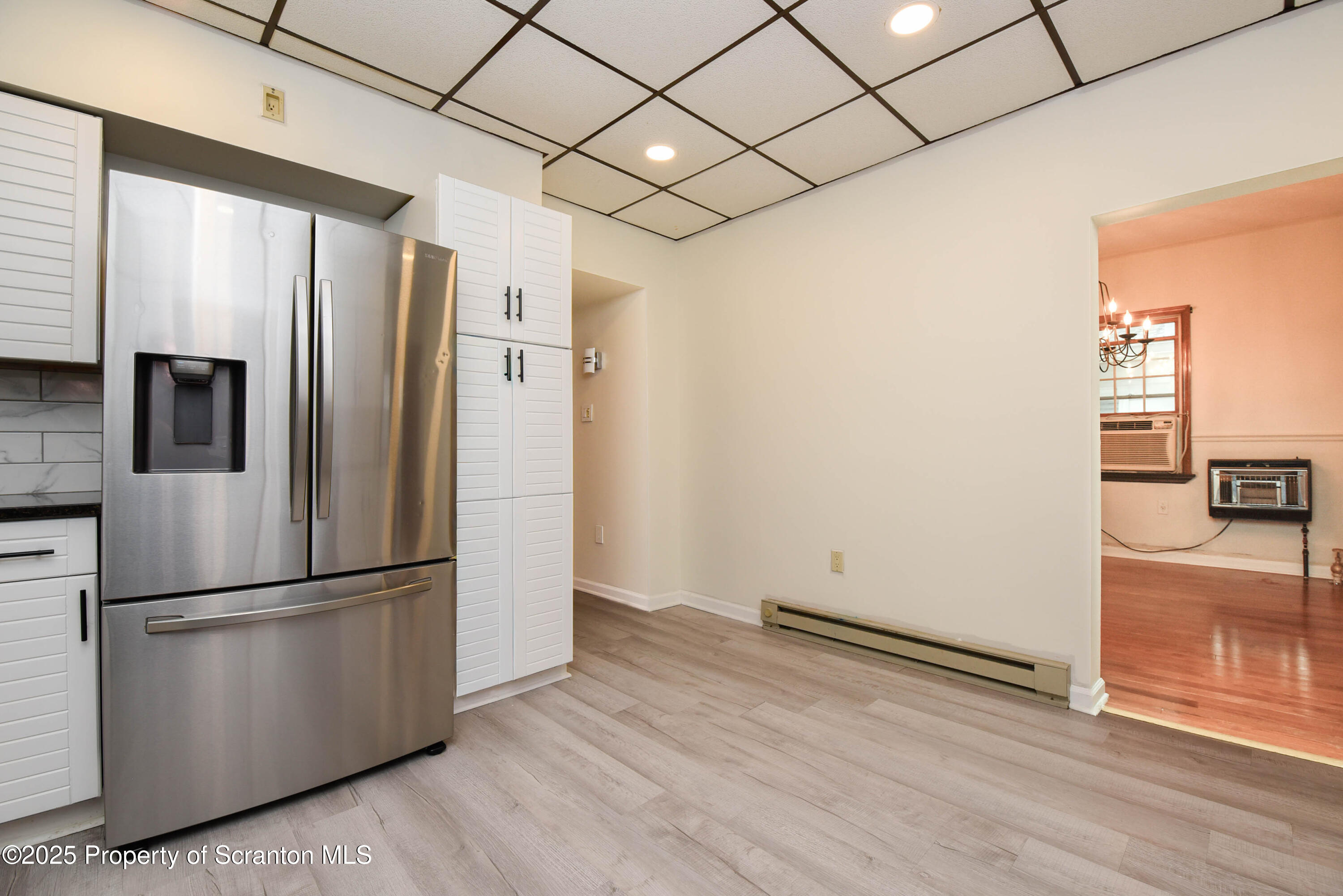 917 Taylor Avenue Scranton, PA 18510 - Photo 17 of 43 a metallic refrigerator freezer sitting in a kitchen