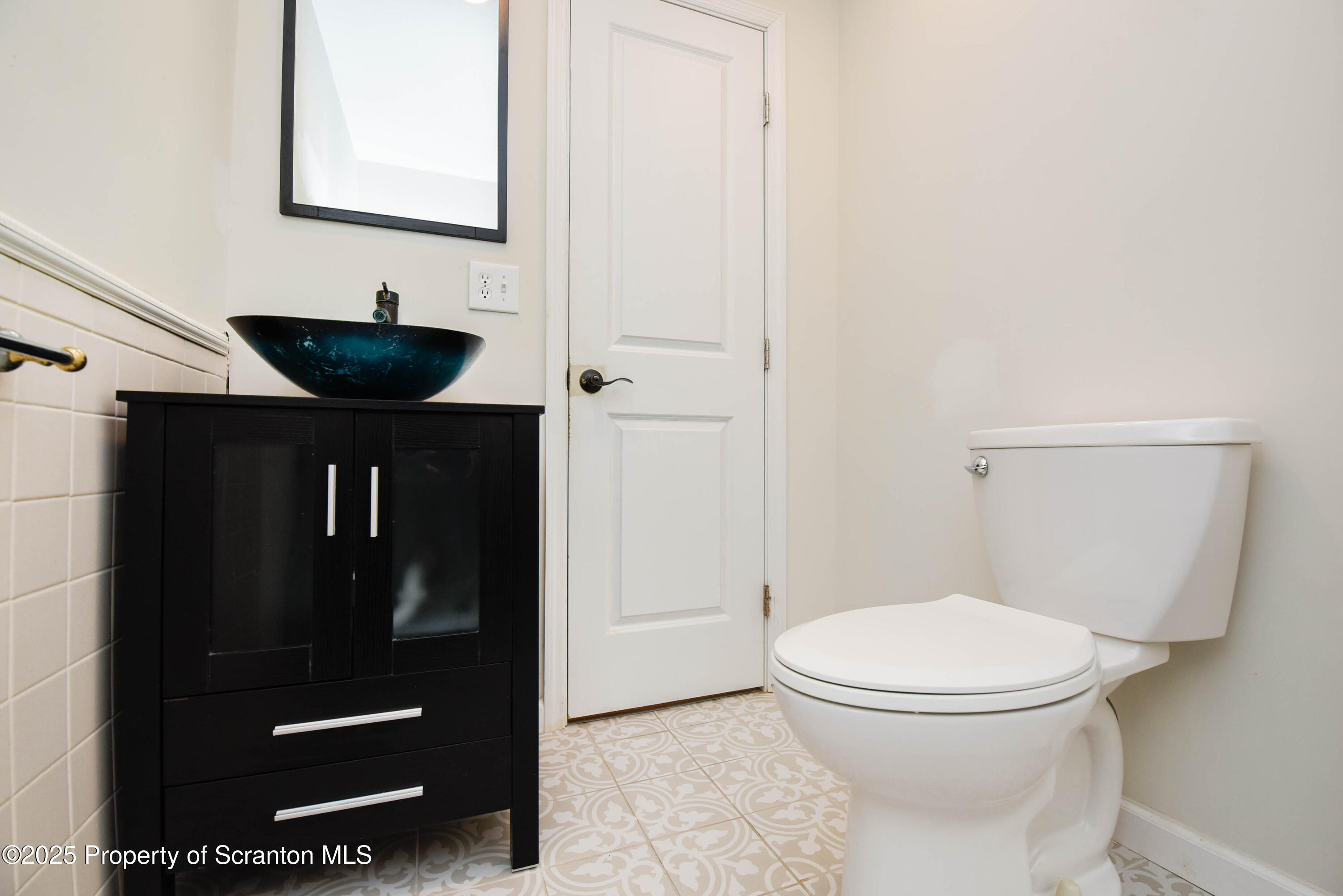 917 Taylor Avenue Scranton, PA 18510 - Photo 22 of 43 a bathroom with a toilet and a sink