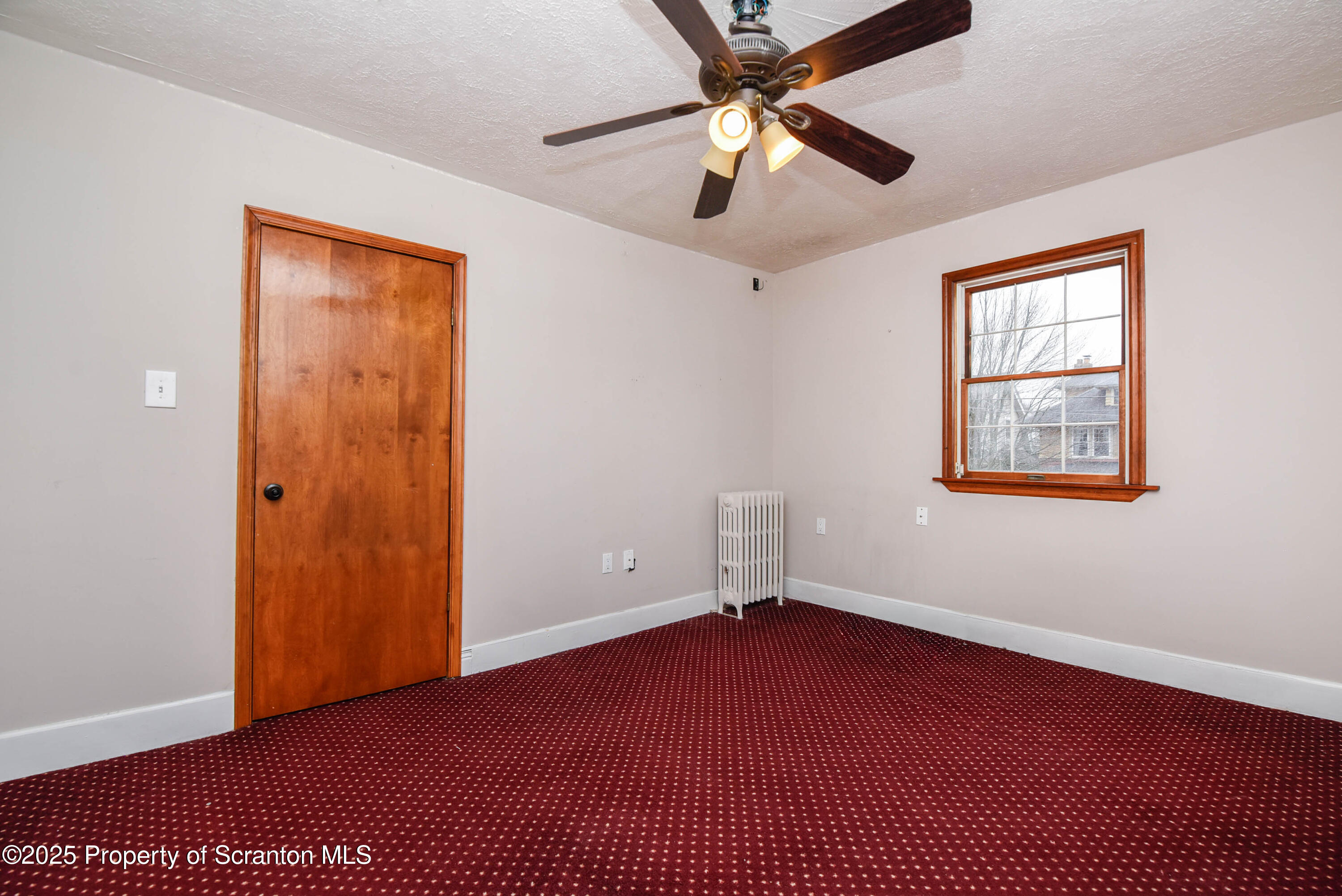 917 Taylor Avenue Scranton, PA 18510 - Photo 26 of 44 a view of an empty room with a window