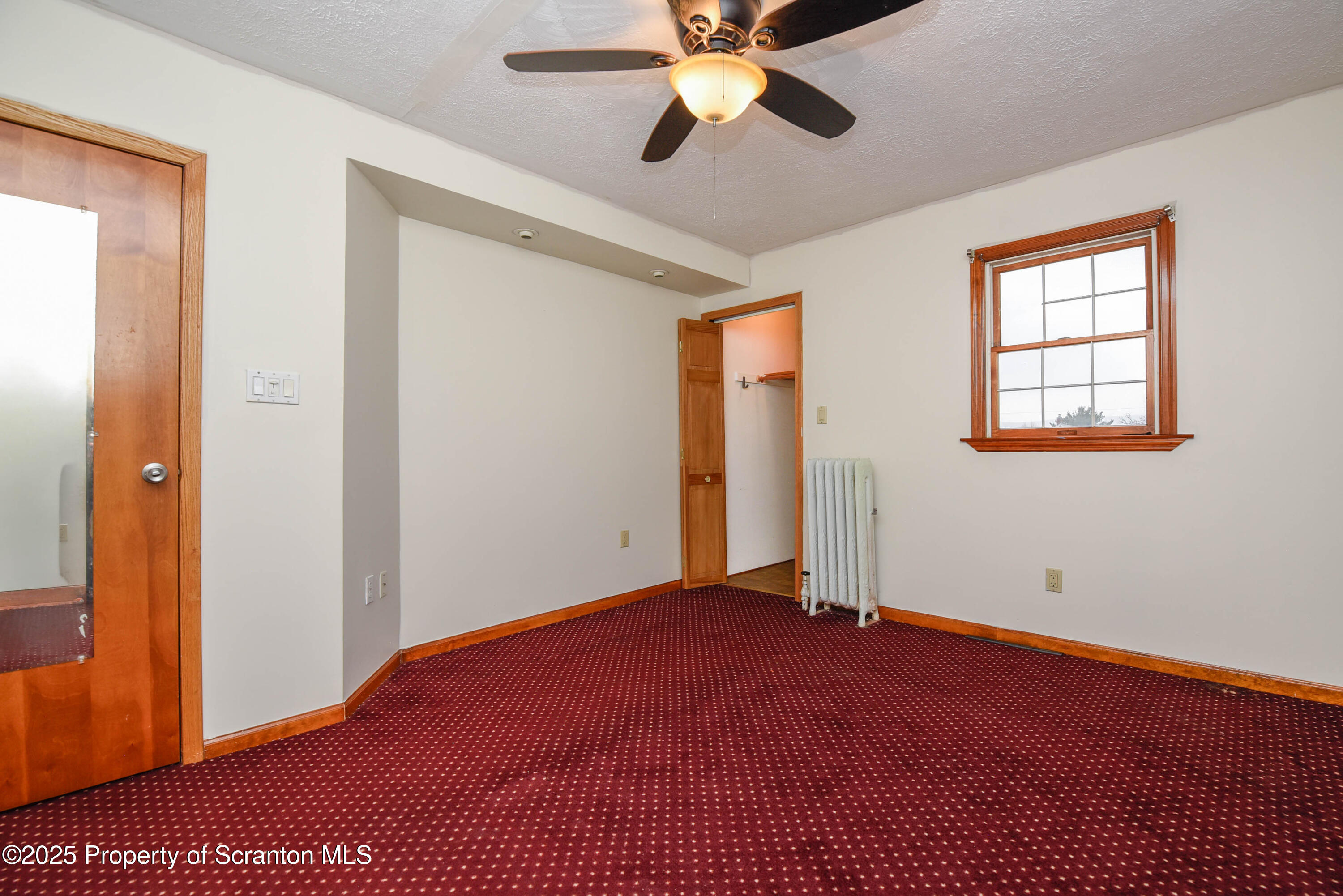 917 Taylor Avenue Scranton, PA 18510 - Photo 31 of 43 wooden floor in an empty room with a window