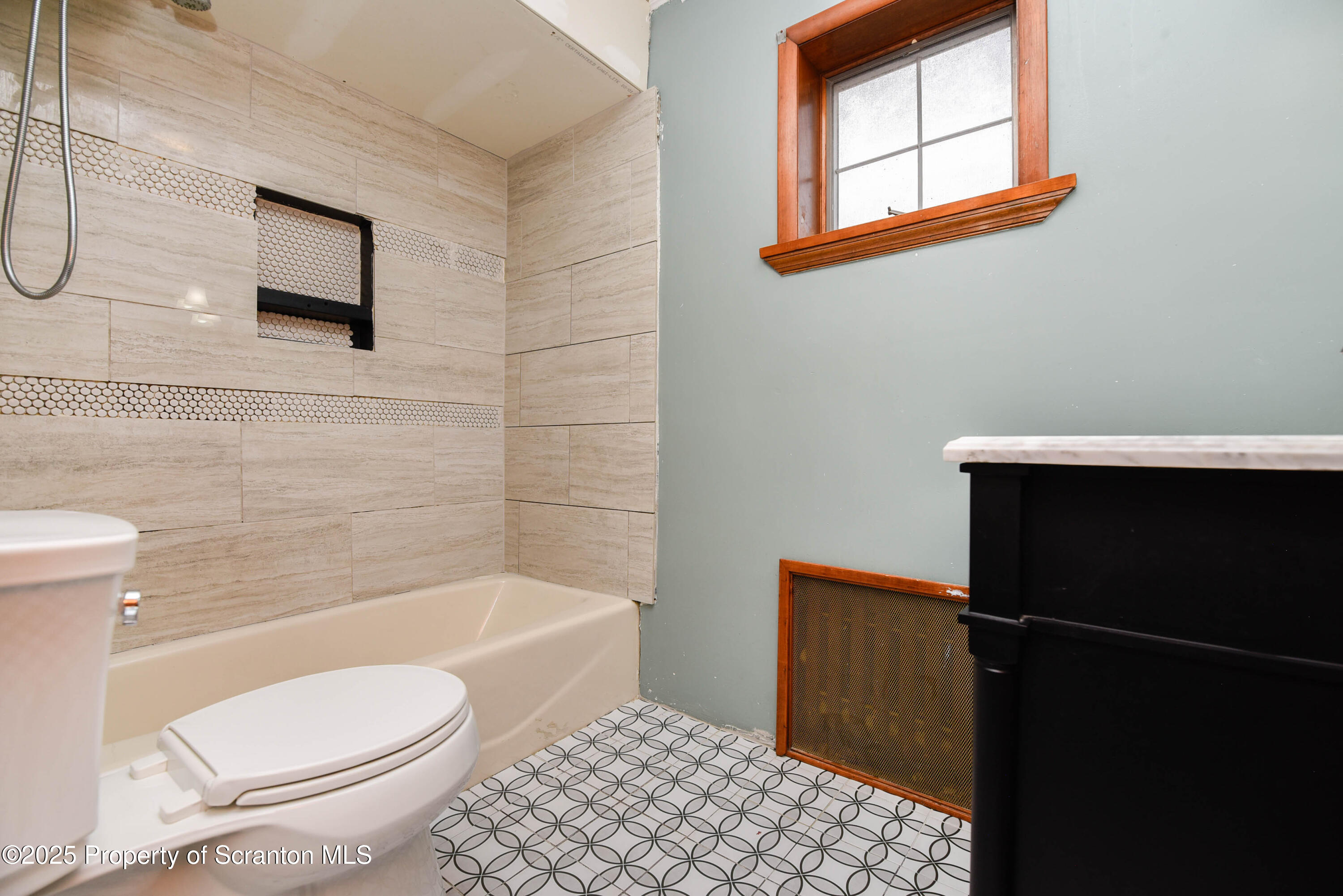 917 Taylor Avenue Scranton, PA 18510 - Photo 35 of 44 a bathroom with a toilet and a shower