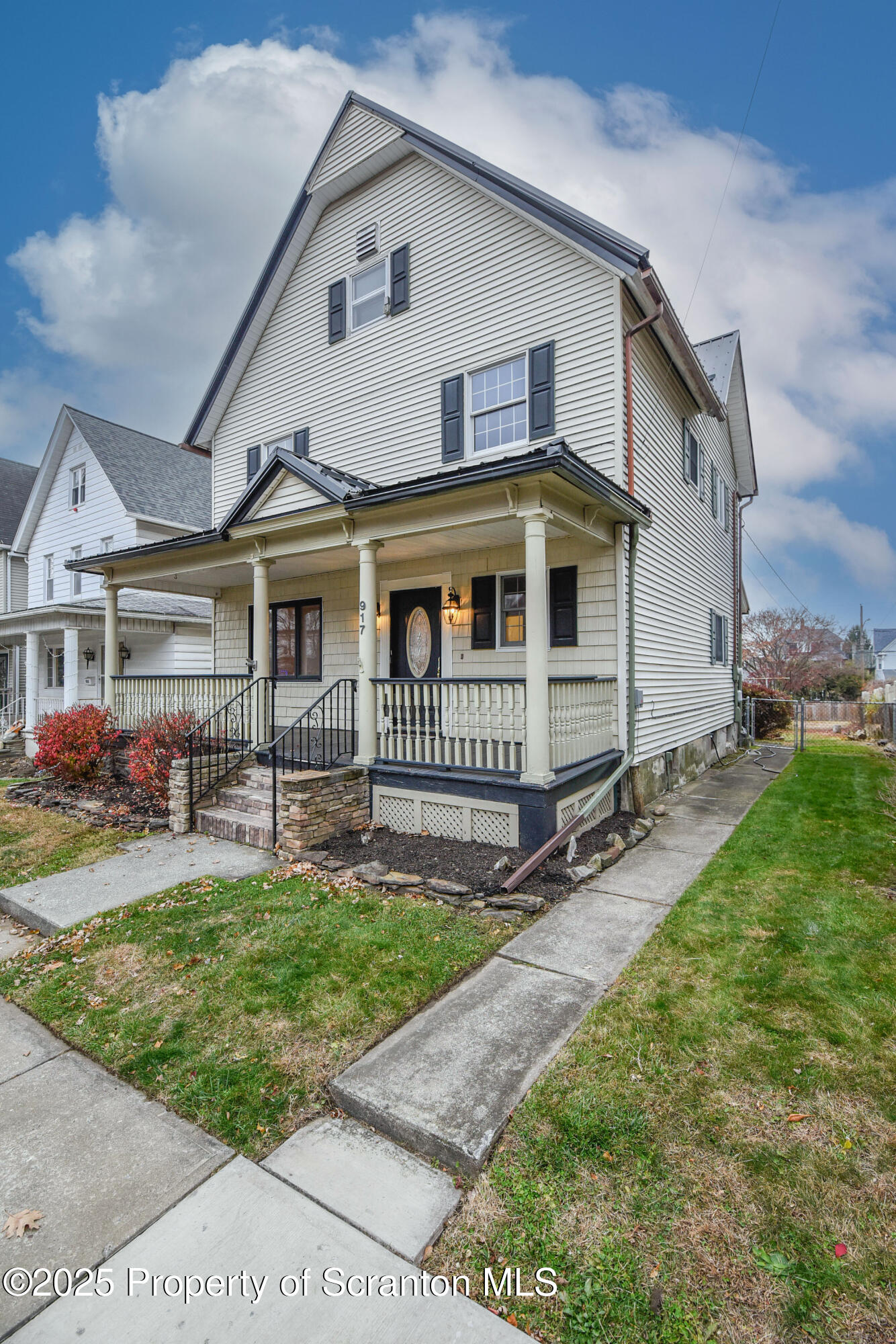 917 Taylor Avenue Scranton, PA 18510 - Photo 4 of 43 a view of house with a yard and patio