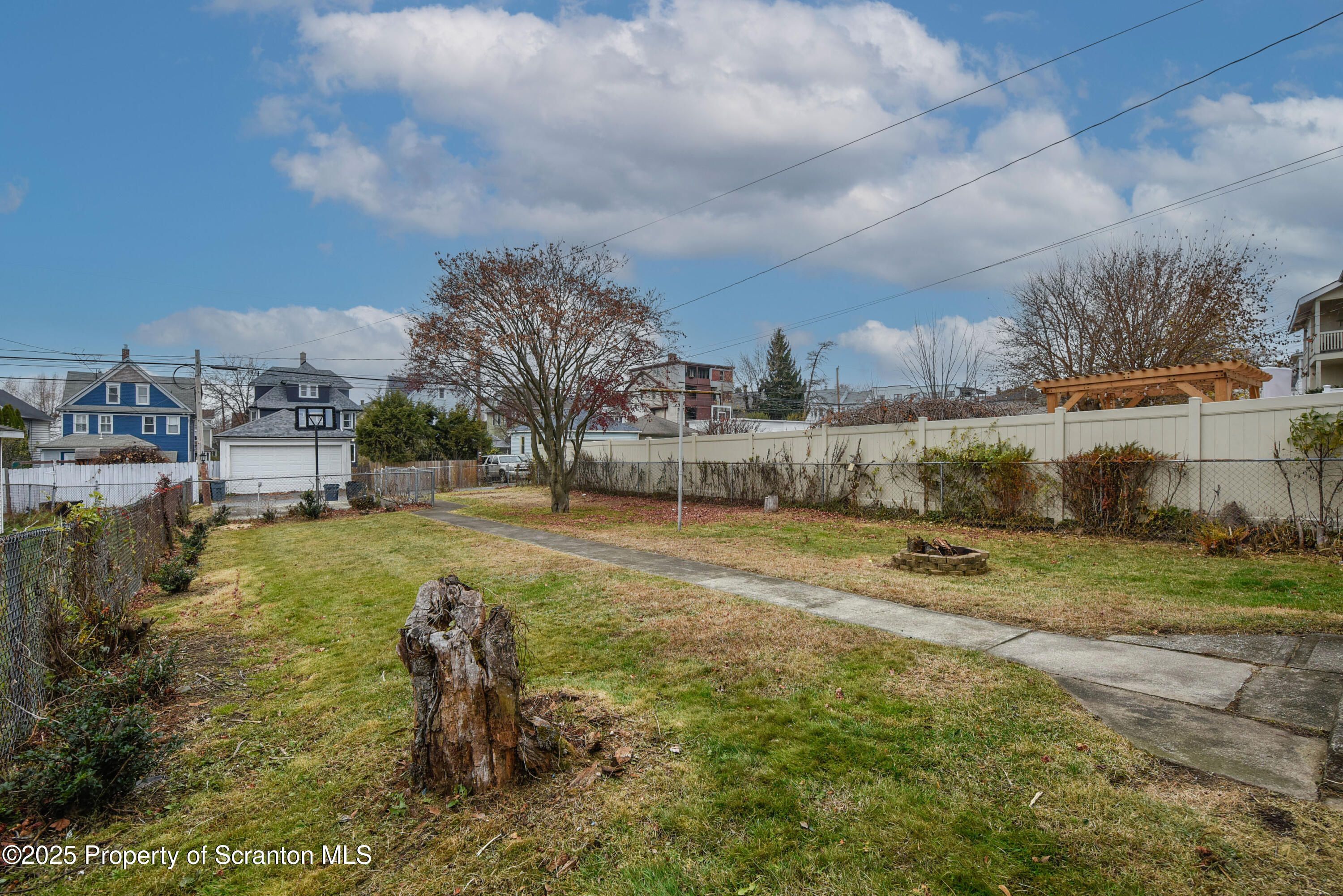 917 Taylor Avenue Scranton, PA 18510 - Photo 43 of 44 a view of yard with swimming pool and trees in the background