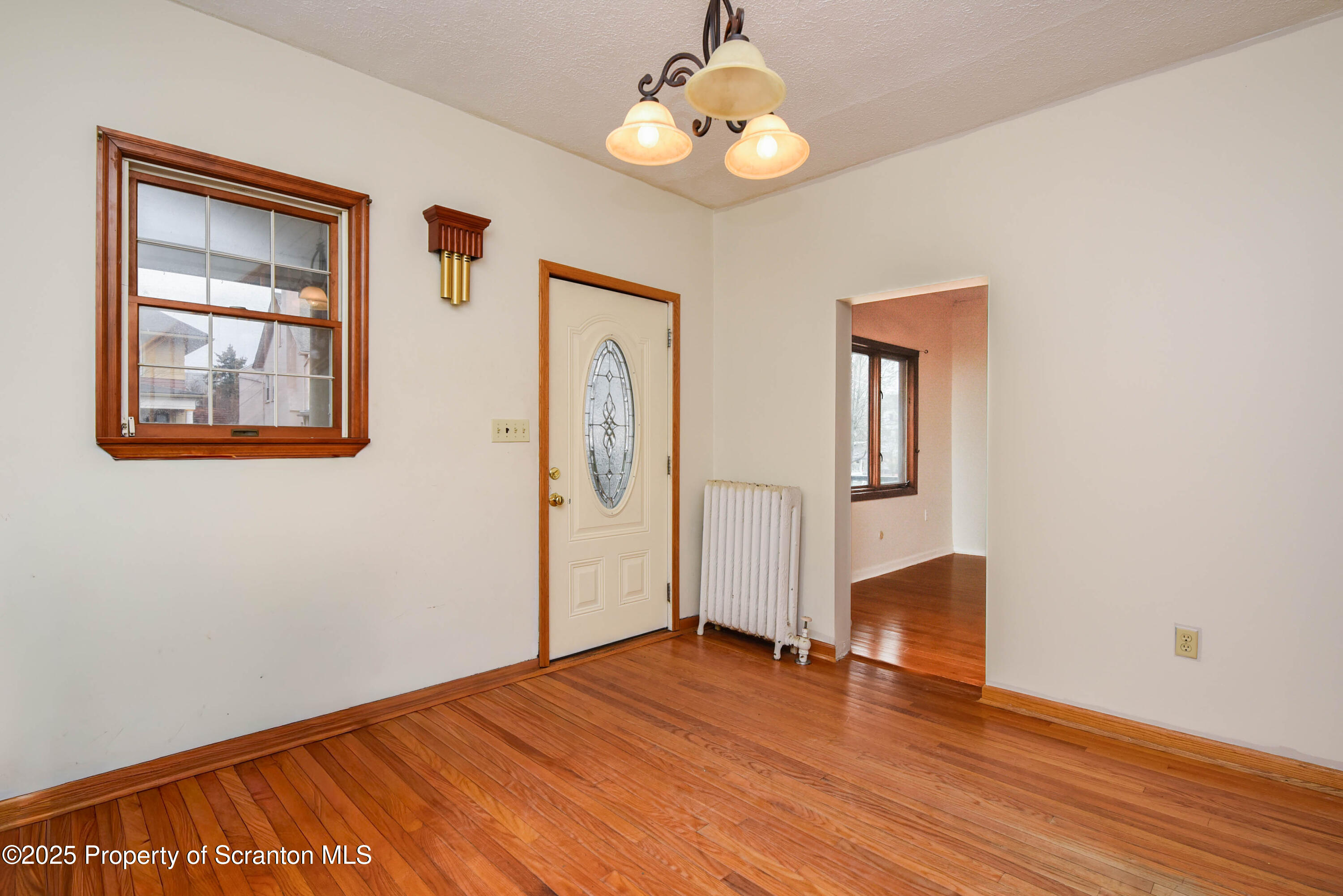 917 Taylor Avenue Scranton, PA 18510 - Photo 6 of 43 a view of empty room with wooden floor