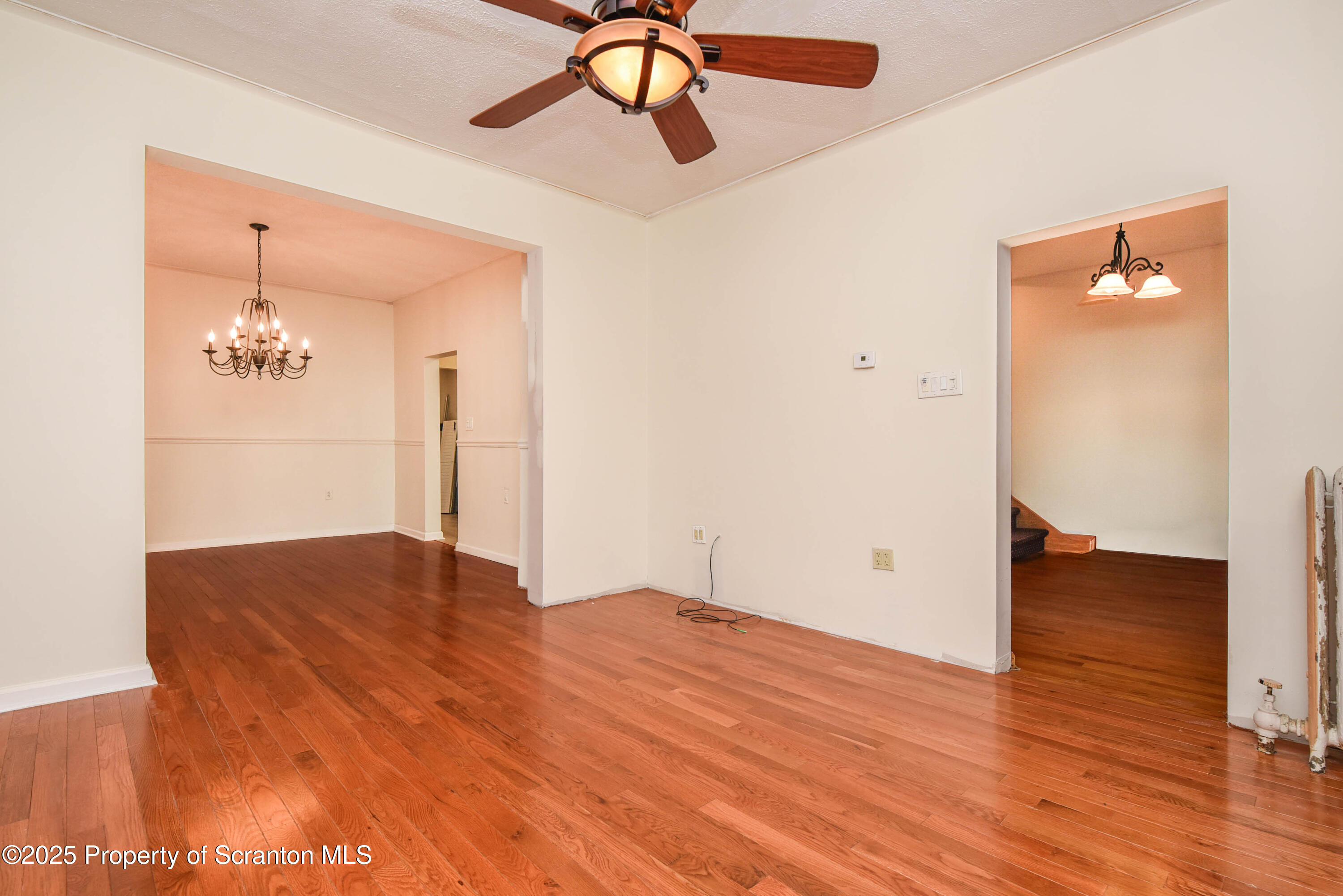 917 Taylor Avenue Scranton, PA 18510 - Photo 8 of 43 a view of empty room with wooden floor