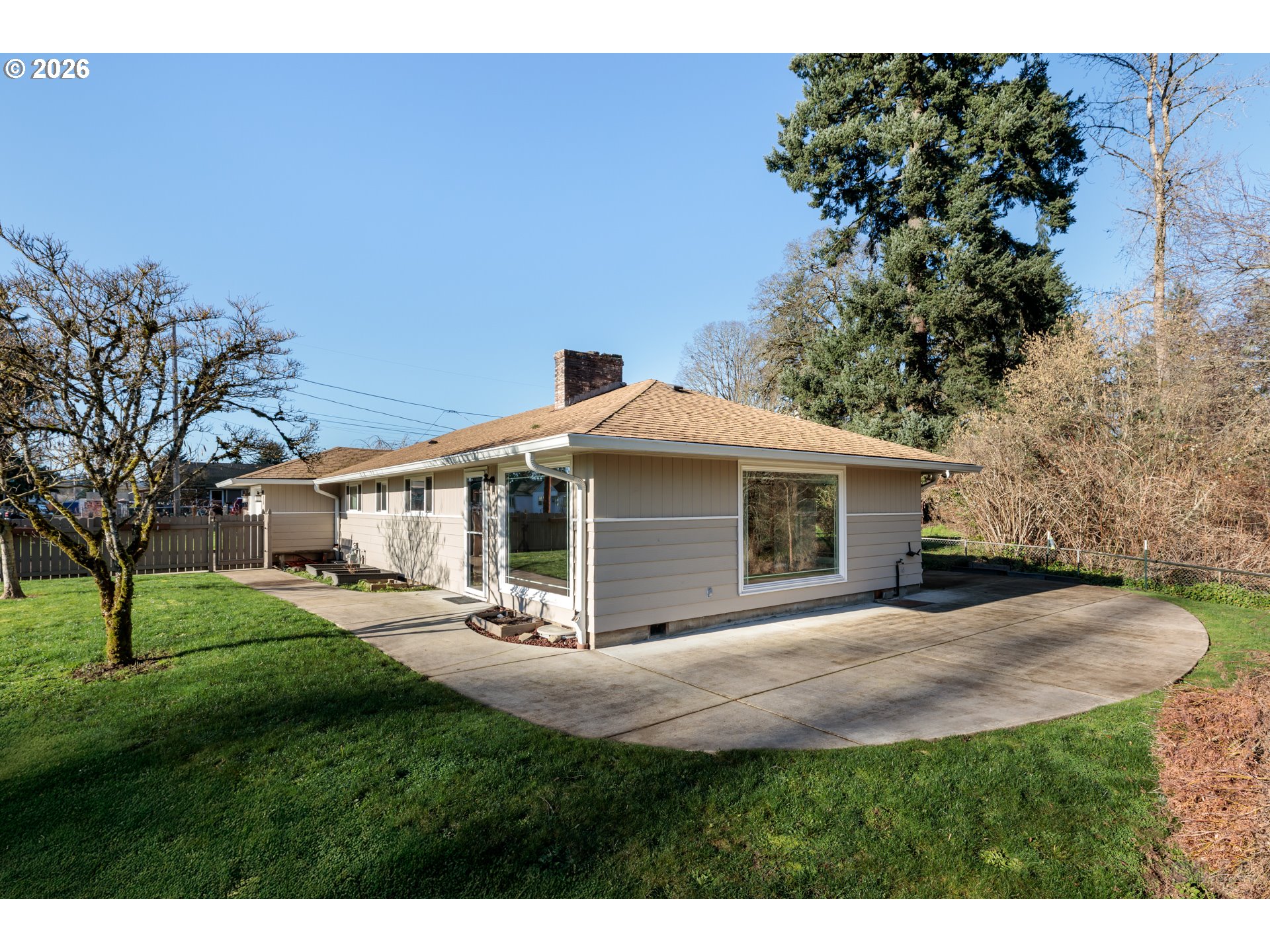 154 Michael Avenue St. Helens, OR 97051 - Photo 20 of 28 a front view of a house with a yard and trees