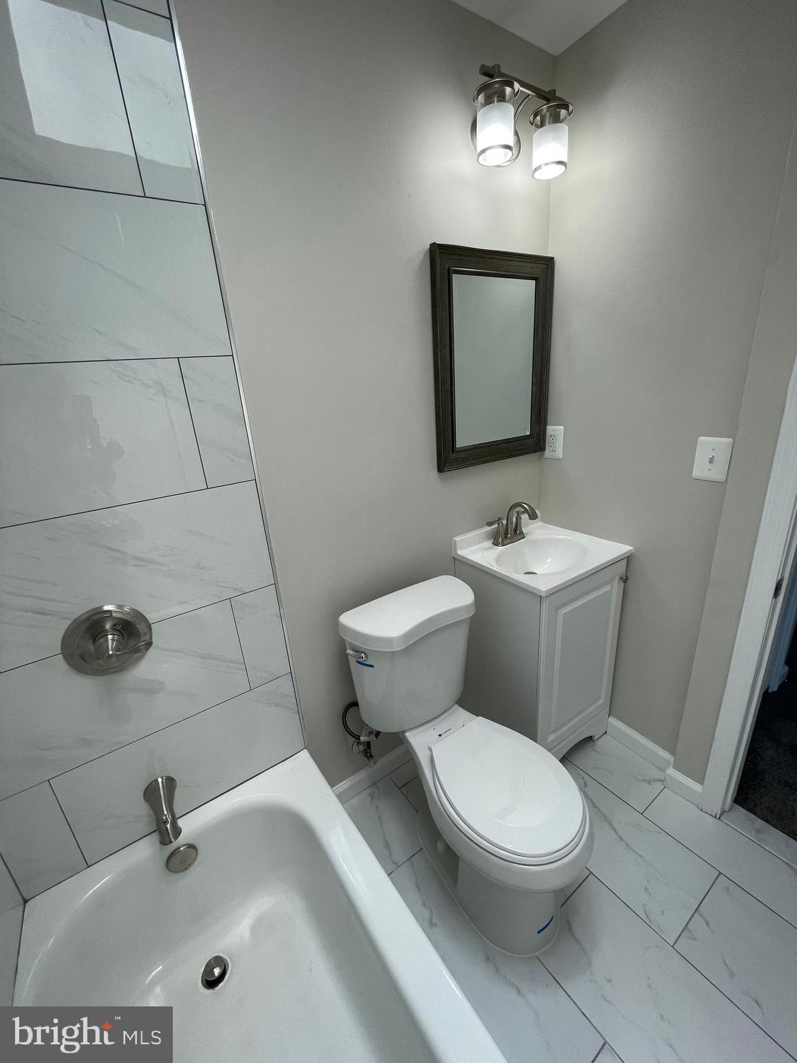 3718 8th Street Baltimore, MD 21225 - Photo 14 of 27 Upstairs Bathroom