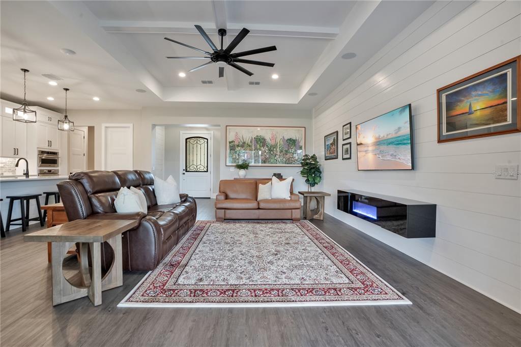 440 Palma Ceia Road Winter Haven, FL 33884 - Photo 23 of 78 a living room with furniture and a rug