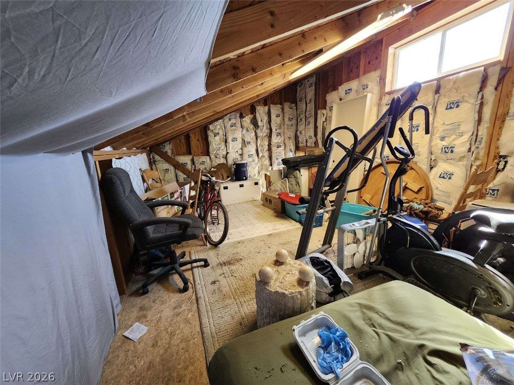 942 Holt Caliente, NV 89008 - Photo 22 of 22 An adaptable attic space offers ample storage solutions with exposed wooden beams.