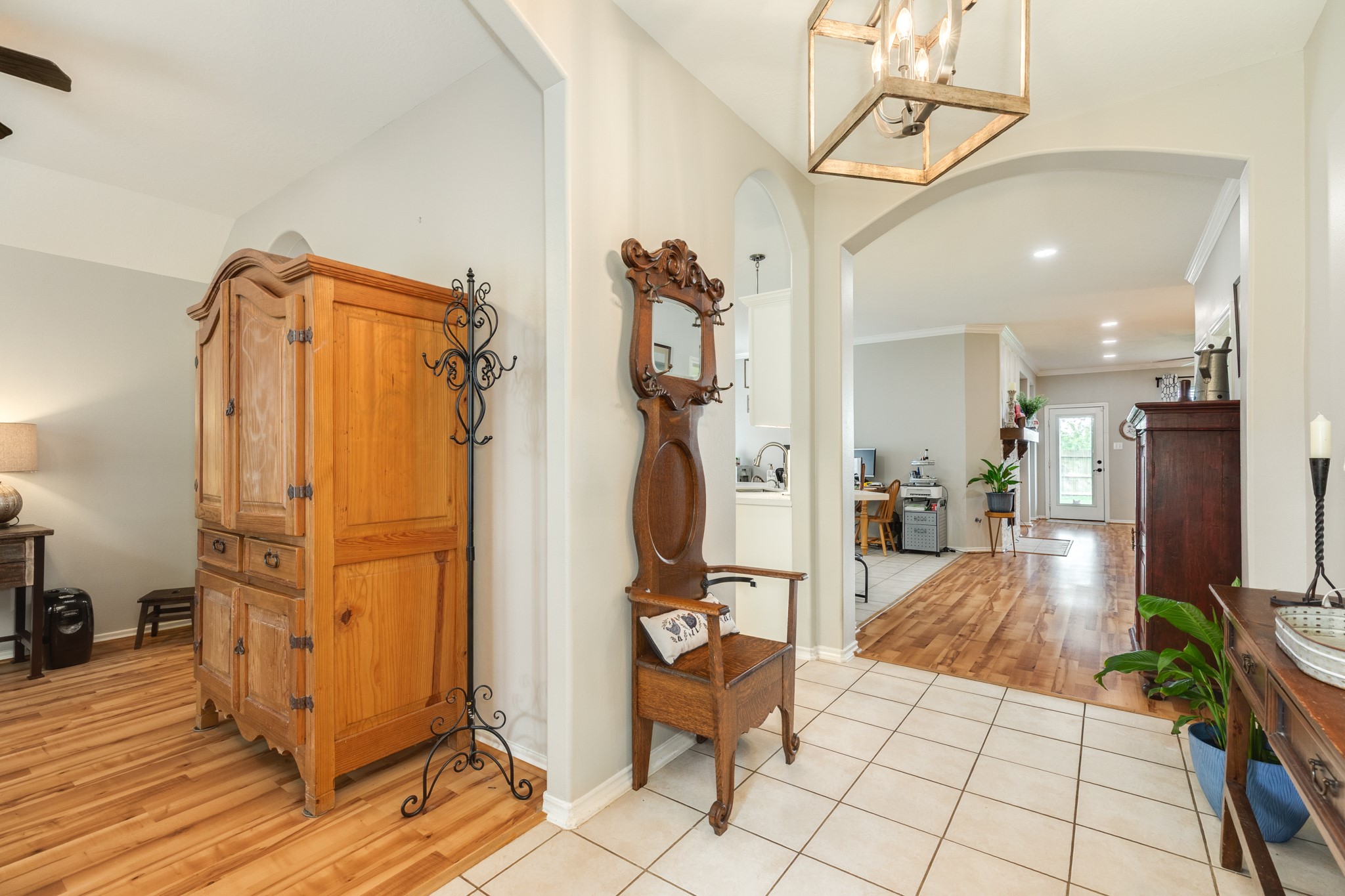13808 Stark Bridge Lane Rosharon, TX 77583 - Photo 36 of 39 Open concept floor plan featuring a seamless transition from the front entryway into the dining and bonus room, leading directly into the kitchen and family area.