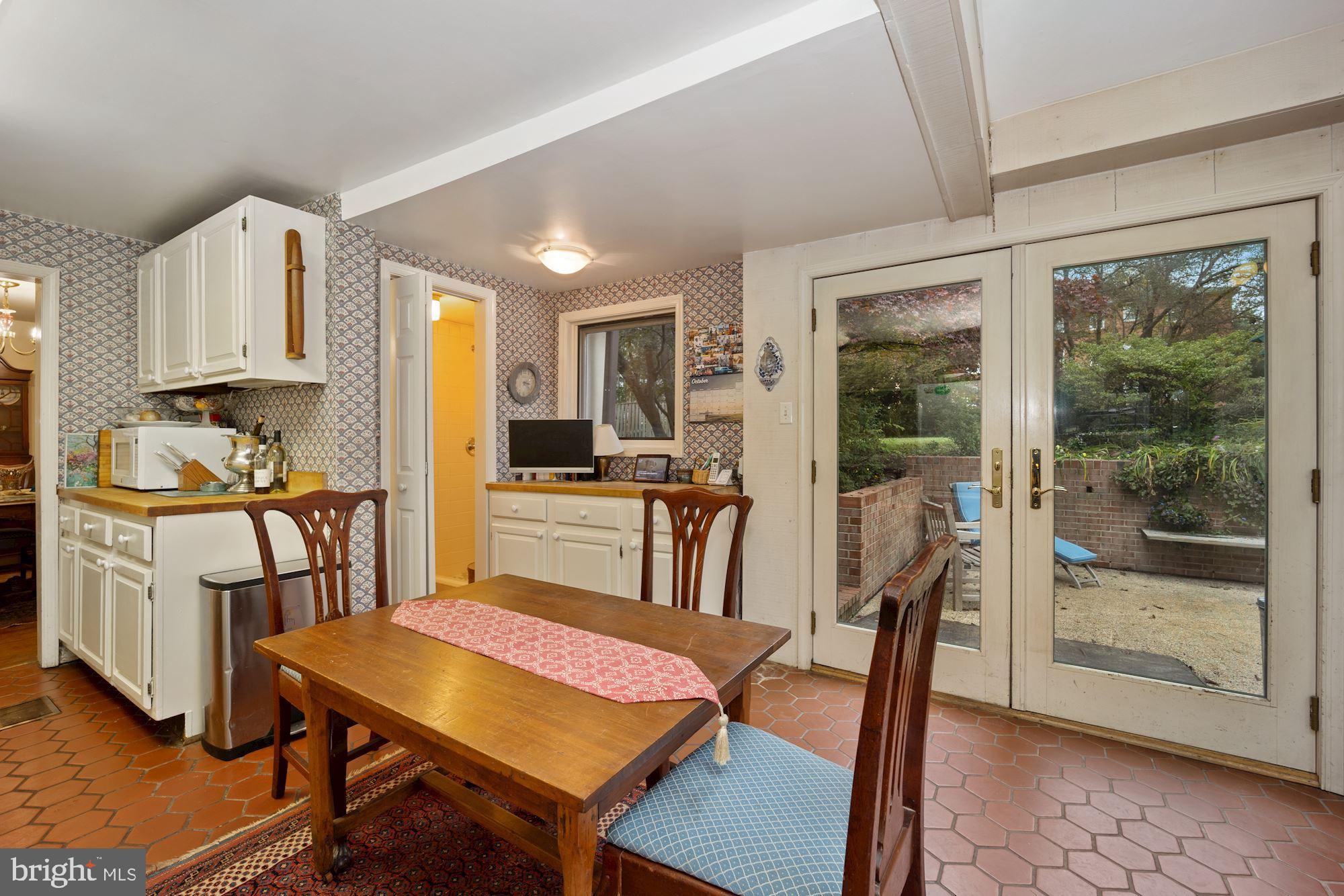 4302 Locust Lane Bethesda, MD 20816 - Photo 11 of 28 Kitchen & Fam Rm open to private rear patio