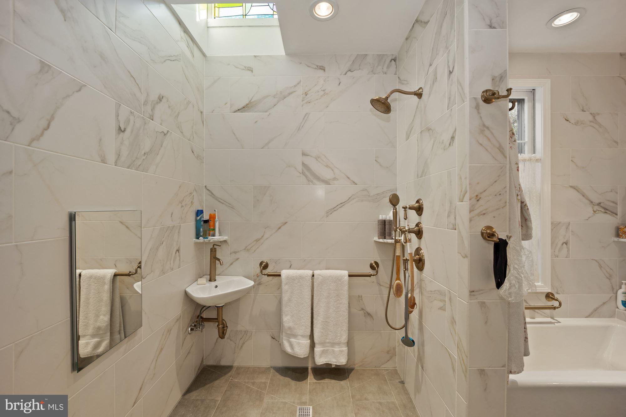 4302 Locust Lane Bethesda, MD 20816 - Photo 18 of 28 Owner's bath has big roll/walk-in shower