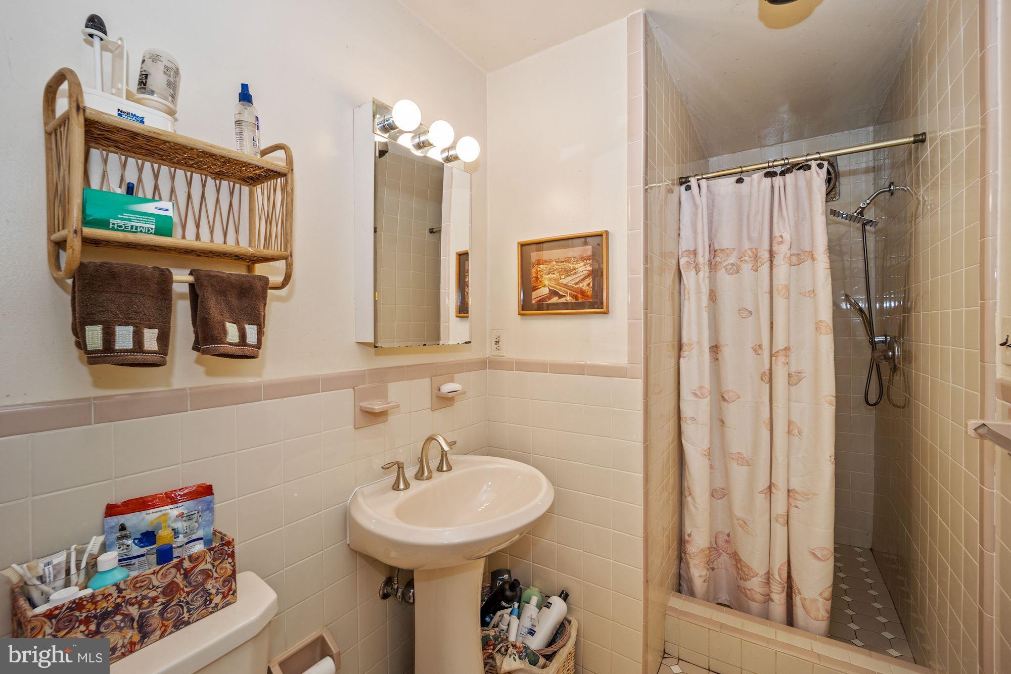 4302 Locust Lane Bethesda, MD 20816 - Photo 20 of 28 Convenient, updated hall bath between BRs 2 & 3