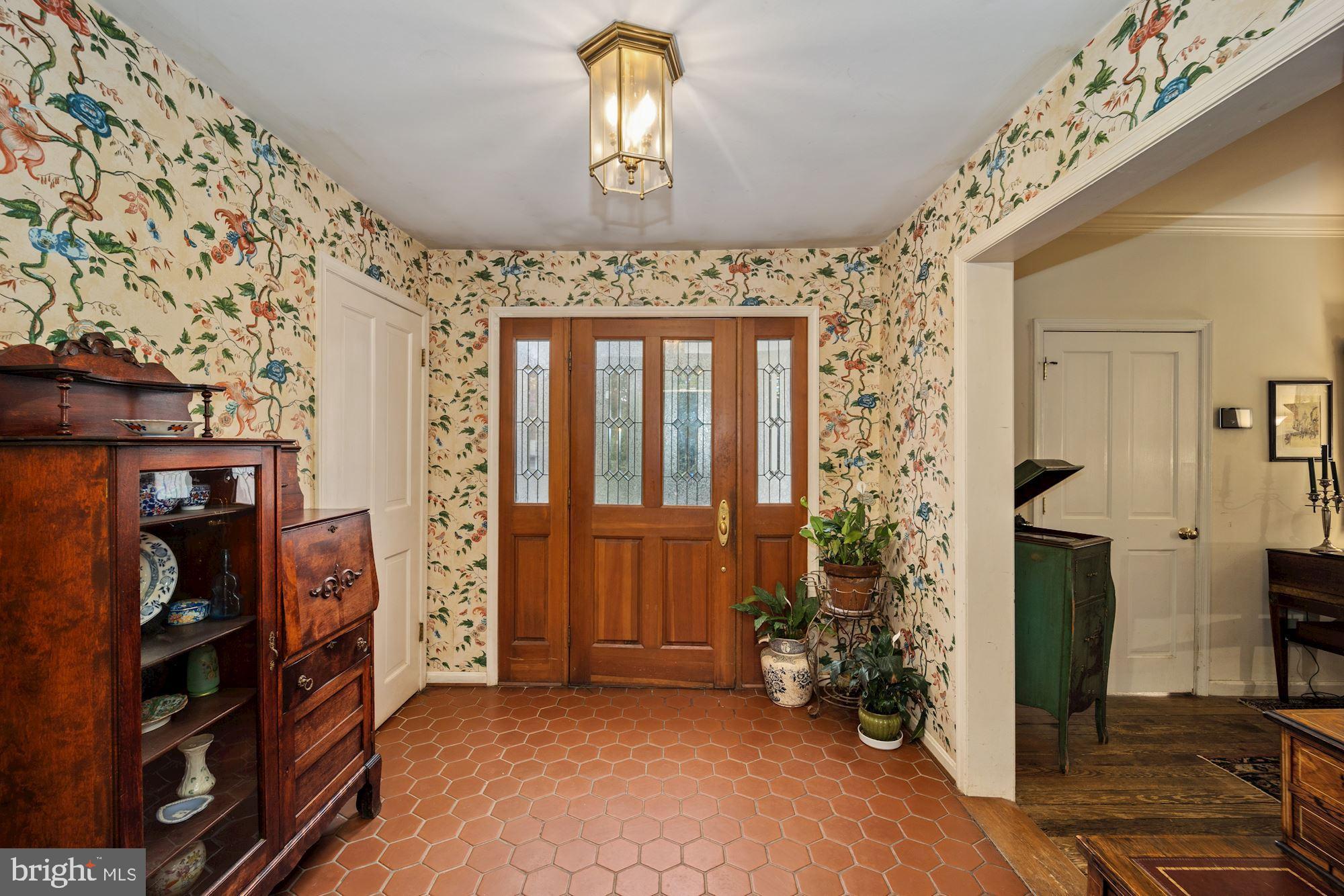 4302 Locust Lane Bethesda, MD 20816 - Photo 4 of 28 The large foyer serves LR & Fam Rm