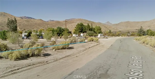a view of a house with a mountain