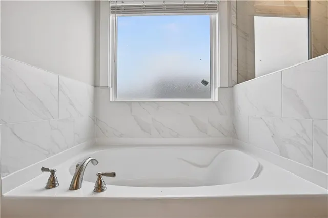 a bathroom with a bathtub