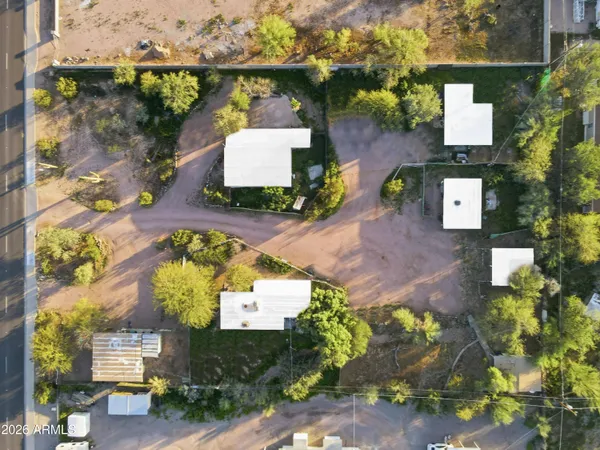 an aerial view of a house with outdoor space
