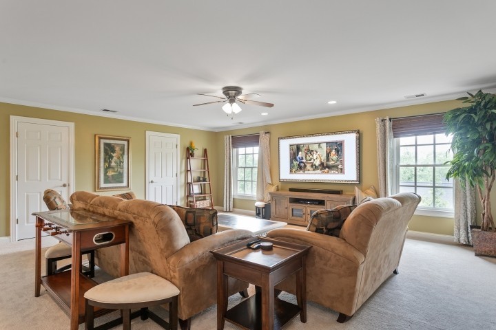 308 Monticello Road Franklin, TN 37064 - Photo 15 of 24 a living room with furniture two windows and a dining table