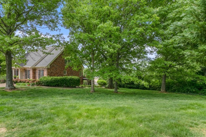 308 Monticello Road Franklin, TN 37064 - Photo 24 of 24 a view of a house with a big yard